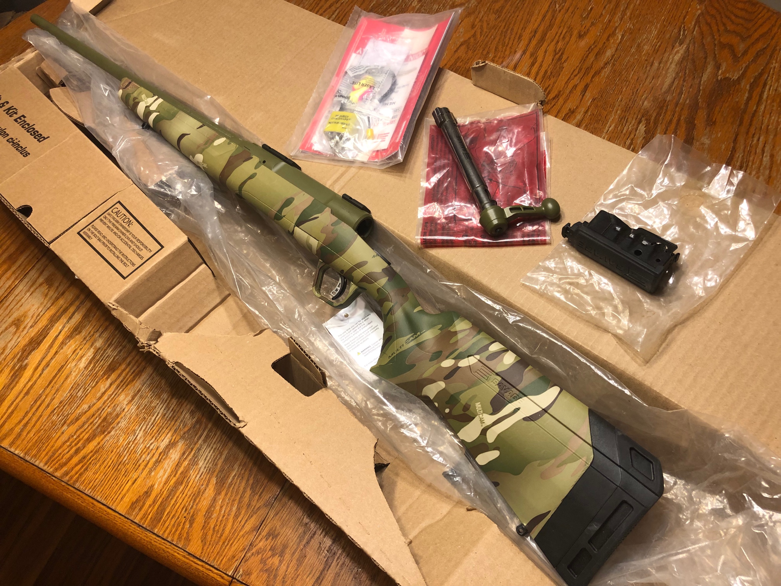 Photo of NEW! Savage Axis II Bolt Action Rifle, 6.5 Creedmoor, Bazooka Green Cerakote 22" Barrel, Multicam Camo Stock **Scope Option -$50 Weaver 3-9x40mm**