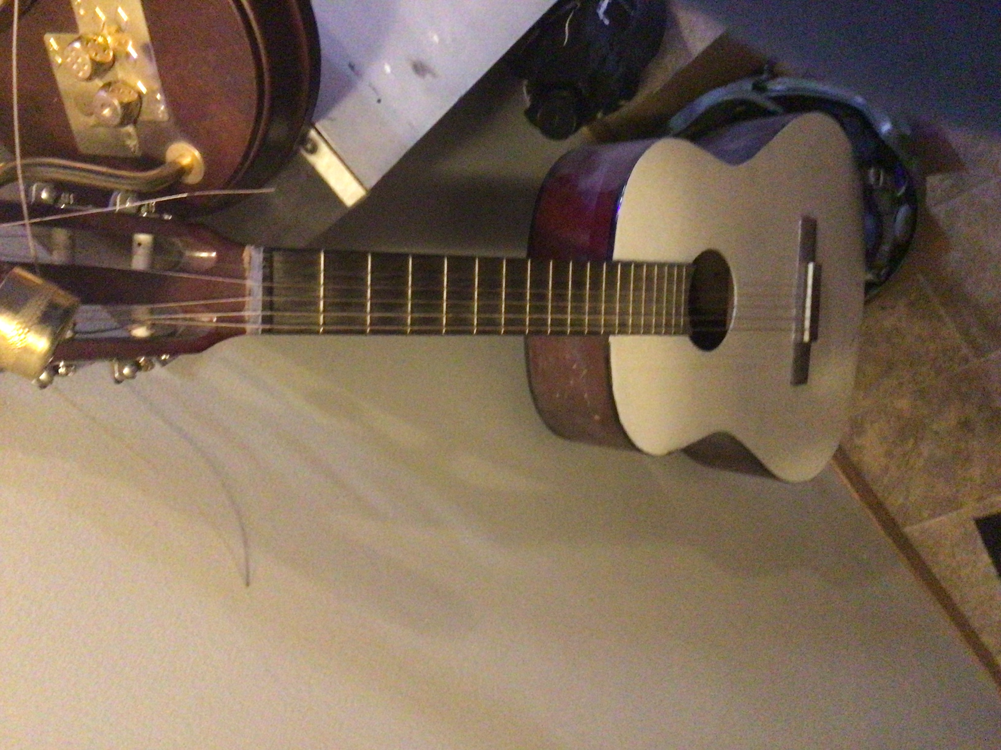 Photo of Electric n acoustic guitars