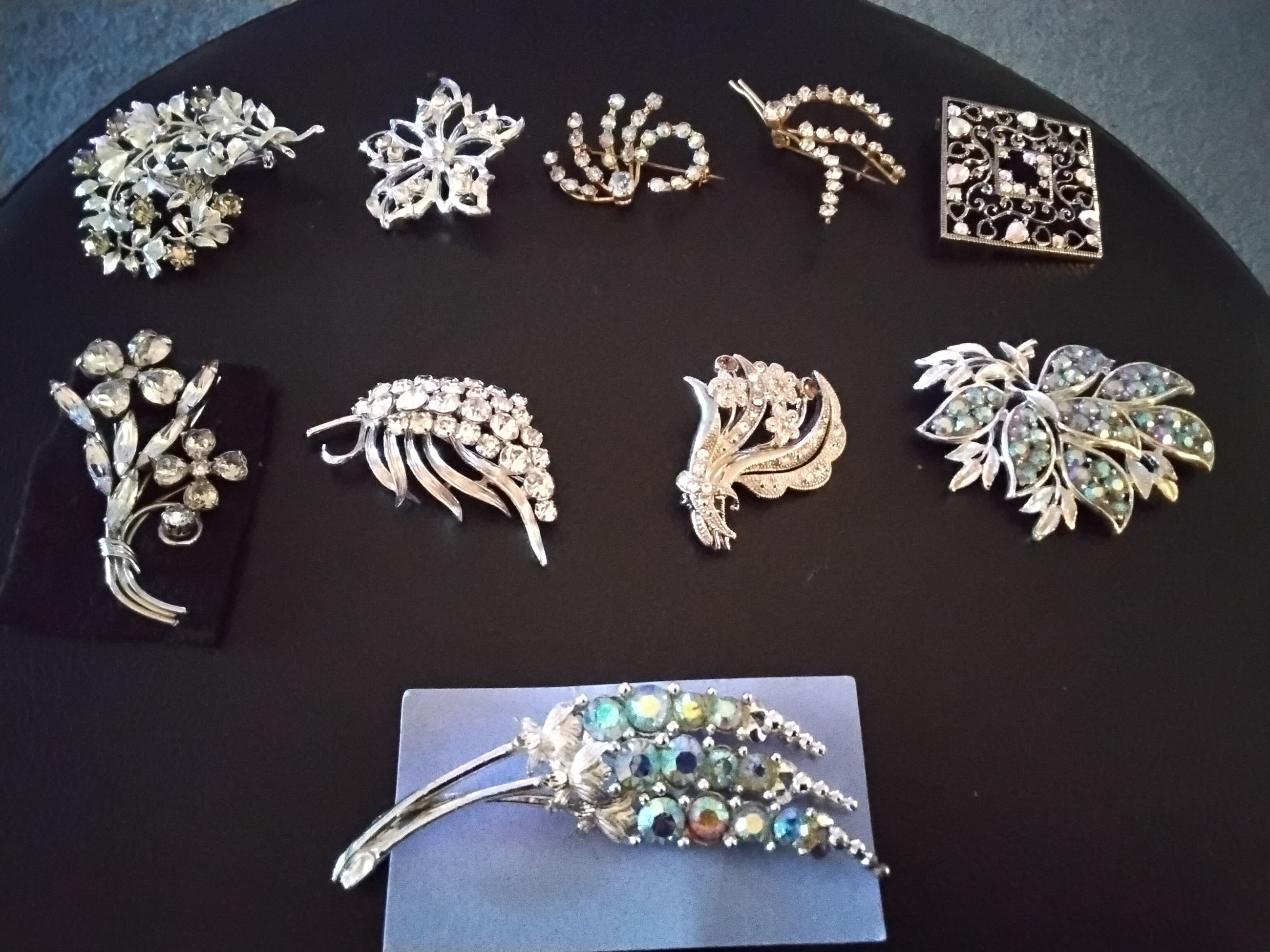 Photo of 10 brooches, rhinestones, iridescent, read ad for prices