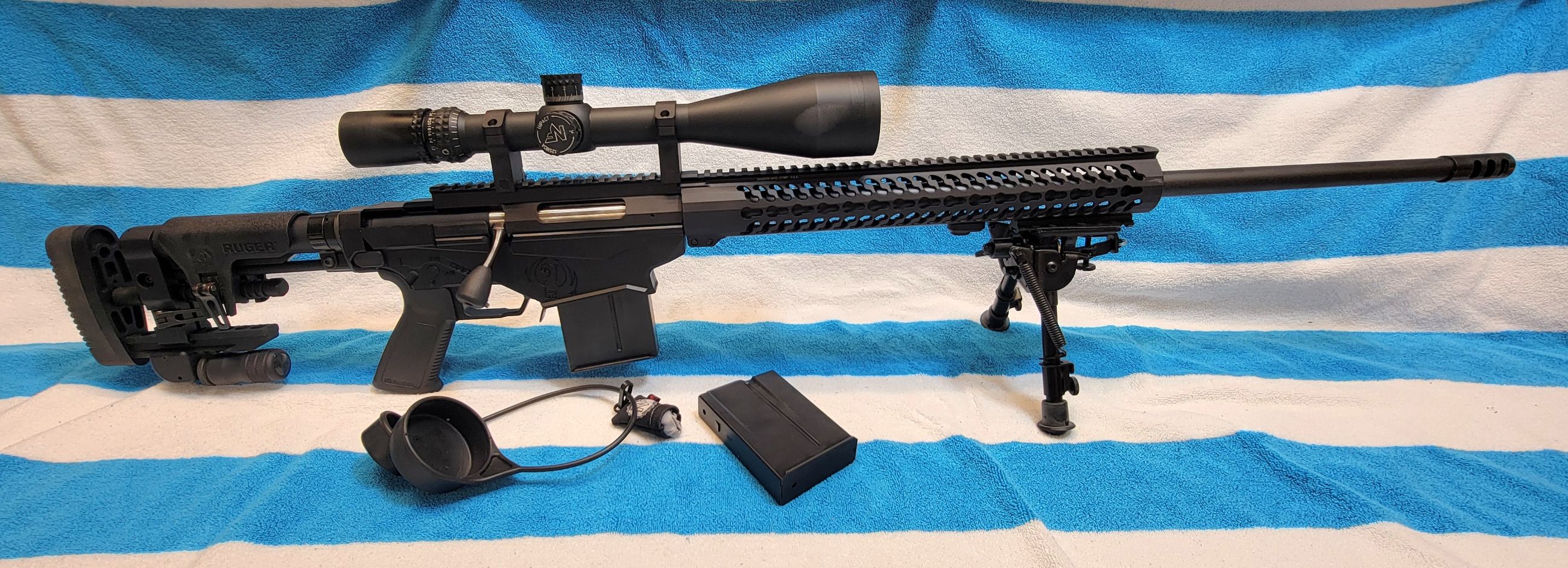 Photo of Ruger Precision Rifle (Gen 1) (RPR) in .243 Win. with Nightforce NXS 8-32x56mm .115 MOA NP-2DD. 