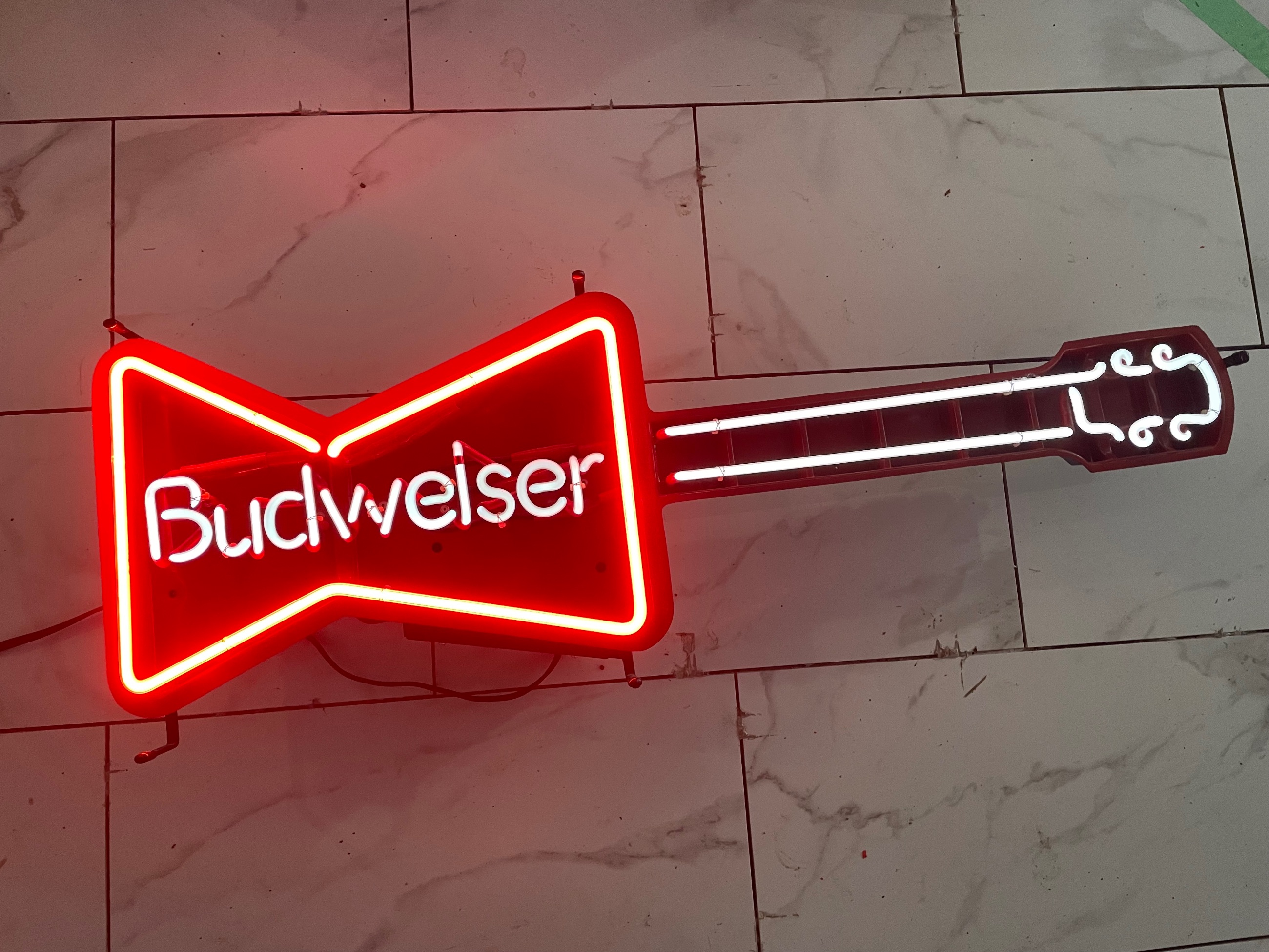 Photo of Neon Budweiser sign