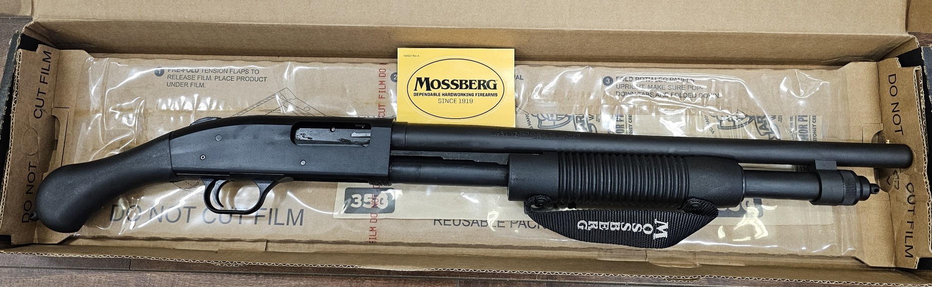 Photo of BNIB Mossberg 590 shotgun 12 gauge with birds head grip, 18.5 inch barrel  $450