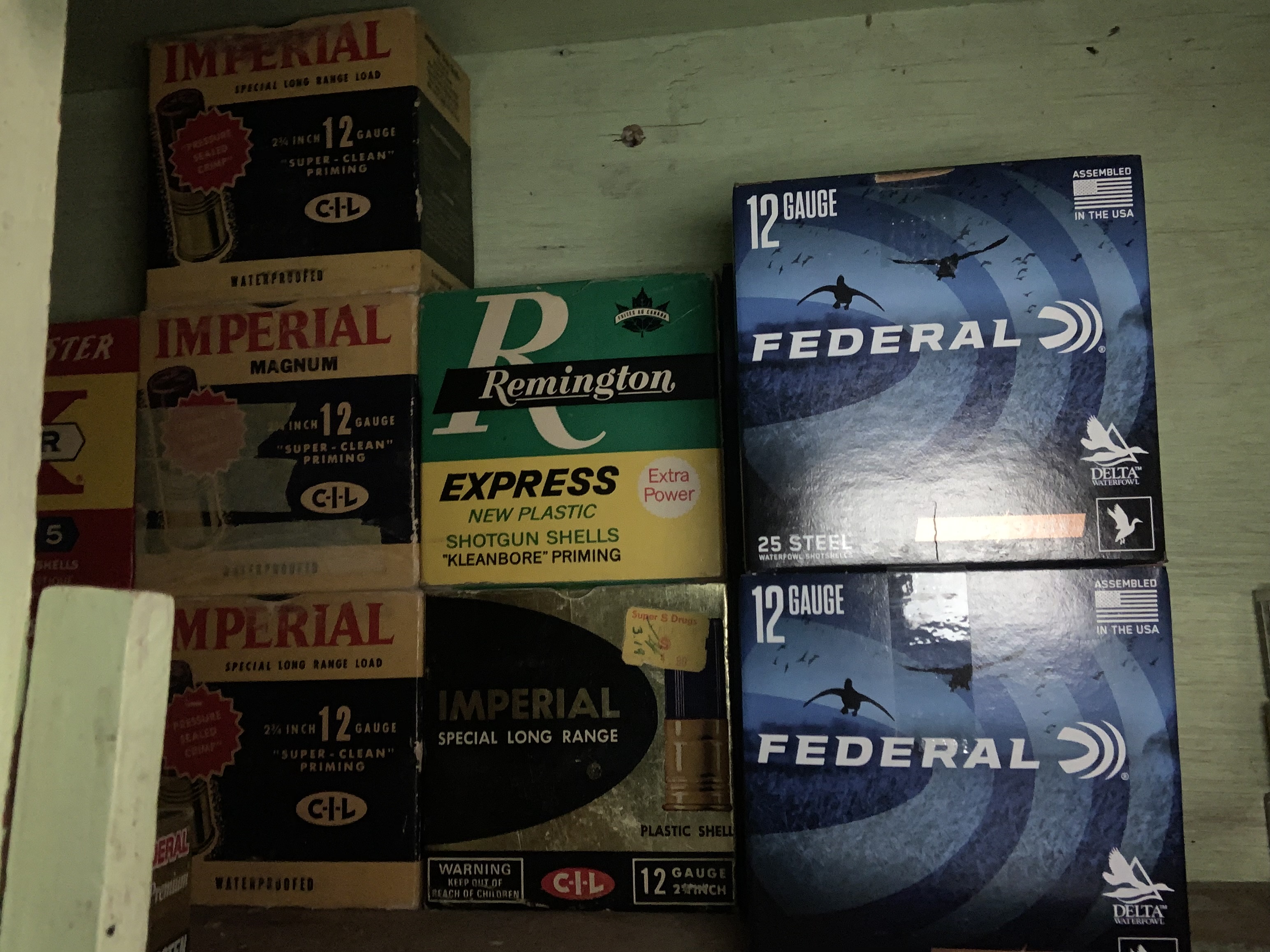 Photo of 19 boxes of bird shot and one box of slugs 