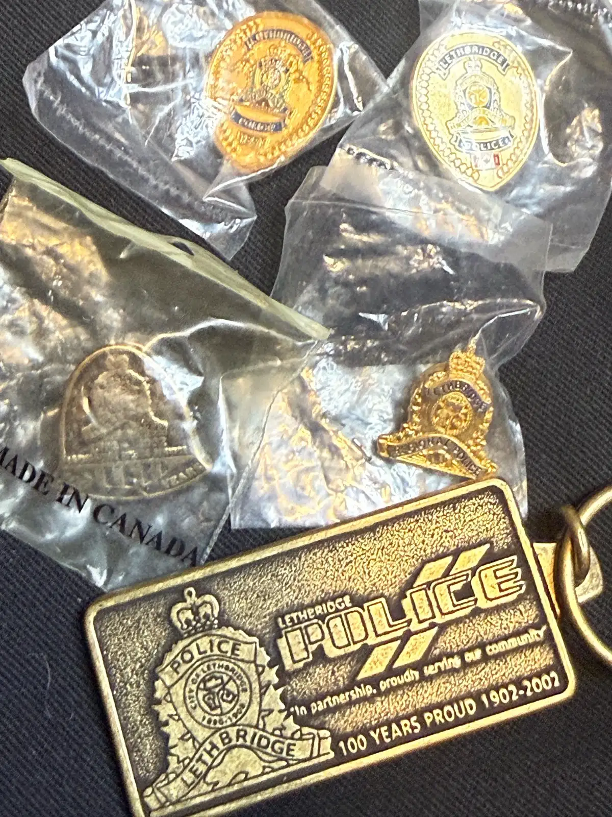Photo of Lethbridge Police Service pins and key chain.