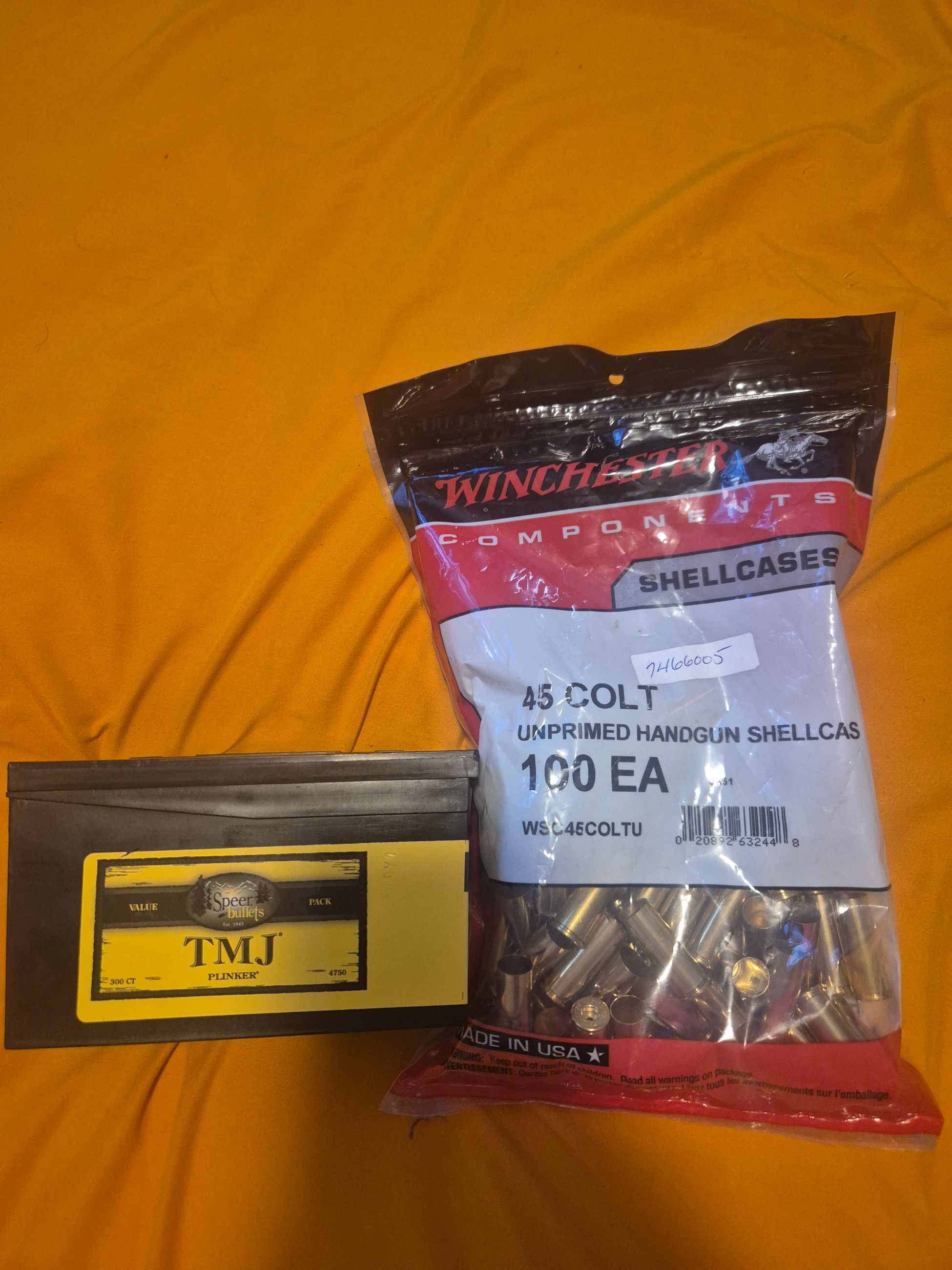 Photo of 45 long colt brass + bullets