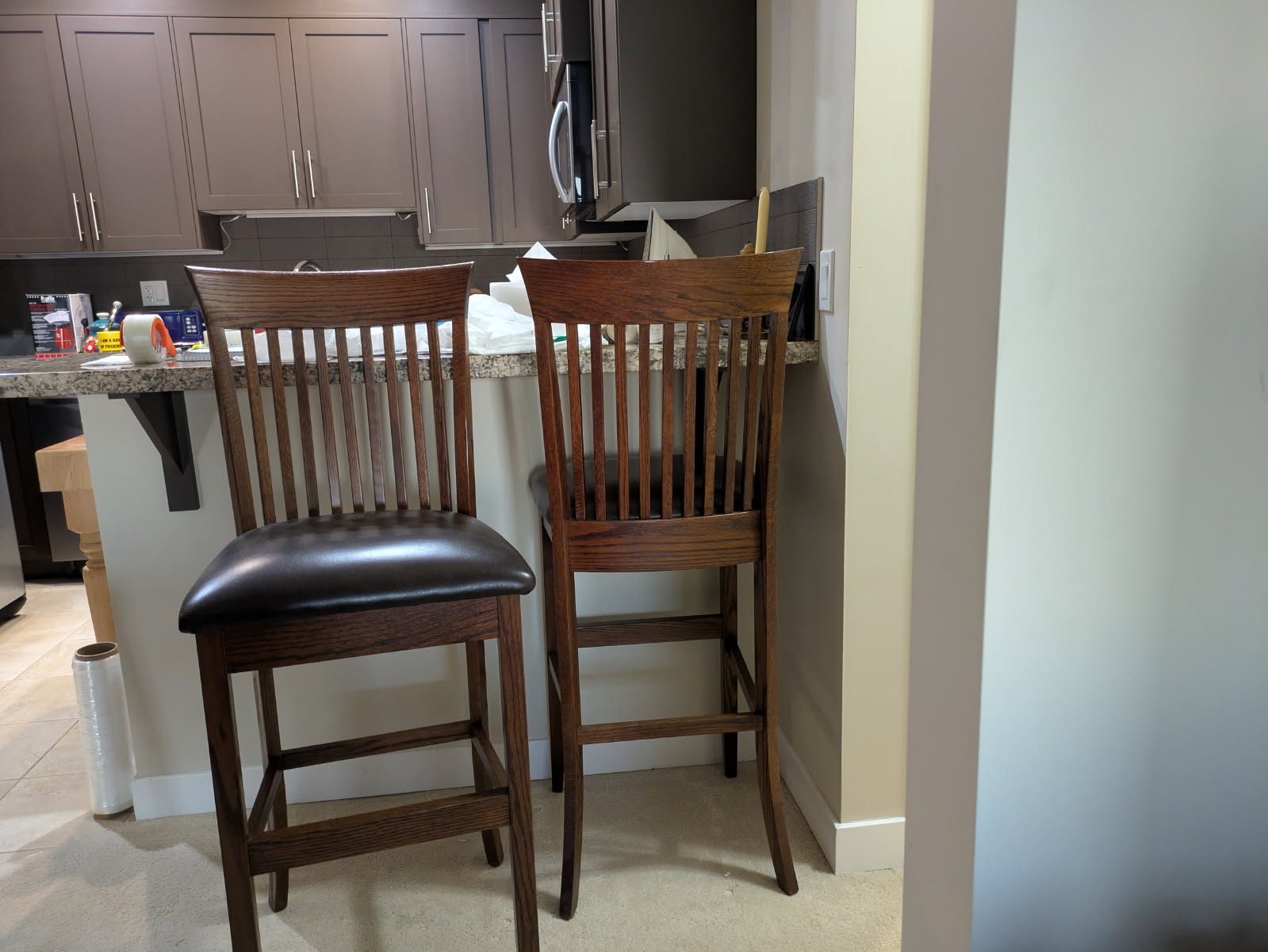 Photo of Solid Oak Bar Chairs w/ Leather Nailhead Detail