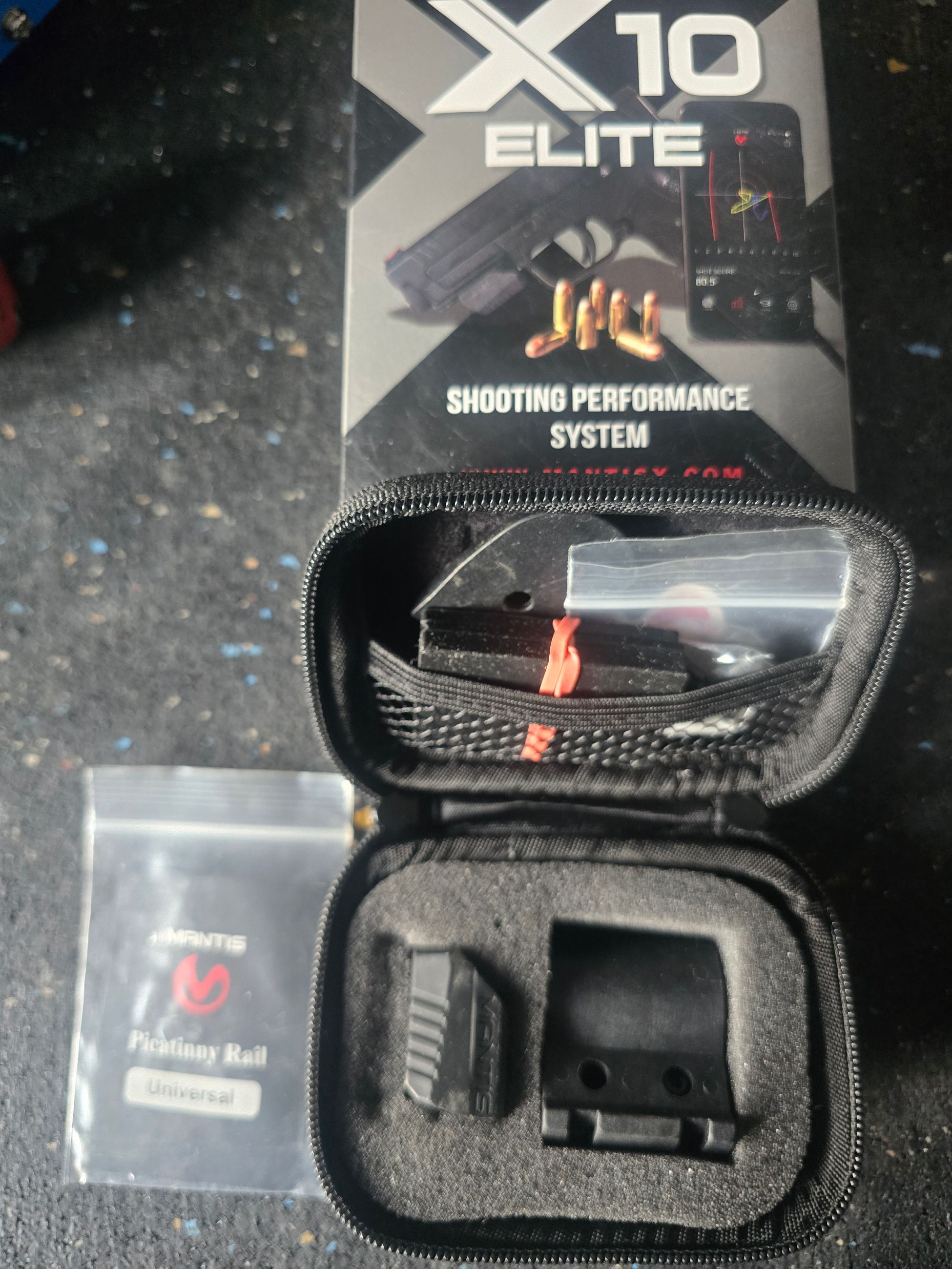 Photo of Mantis x 10 elite with a universal Picatinny rail