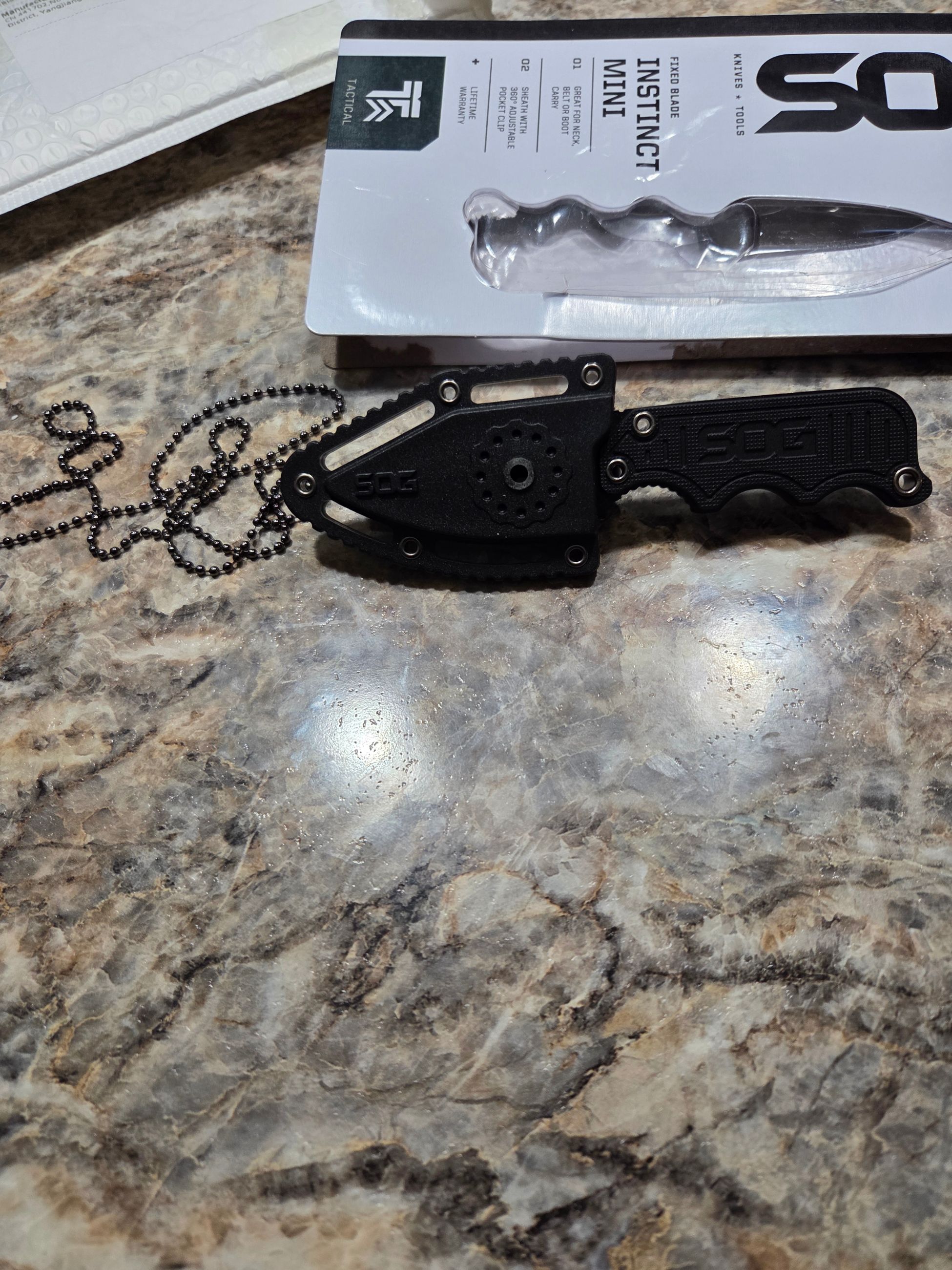 Photo of Sog instinct neck knife