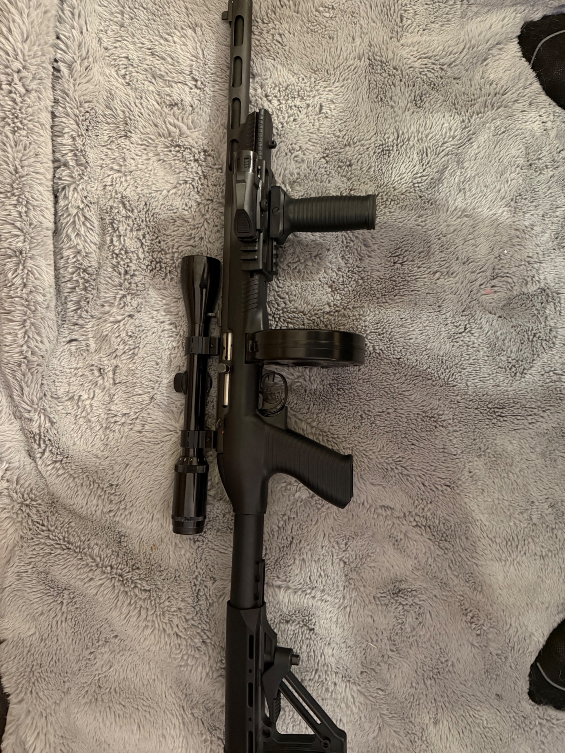 Photo of Pierre’s pps 50 with drum mag and scope