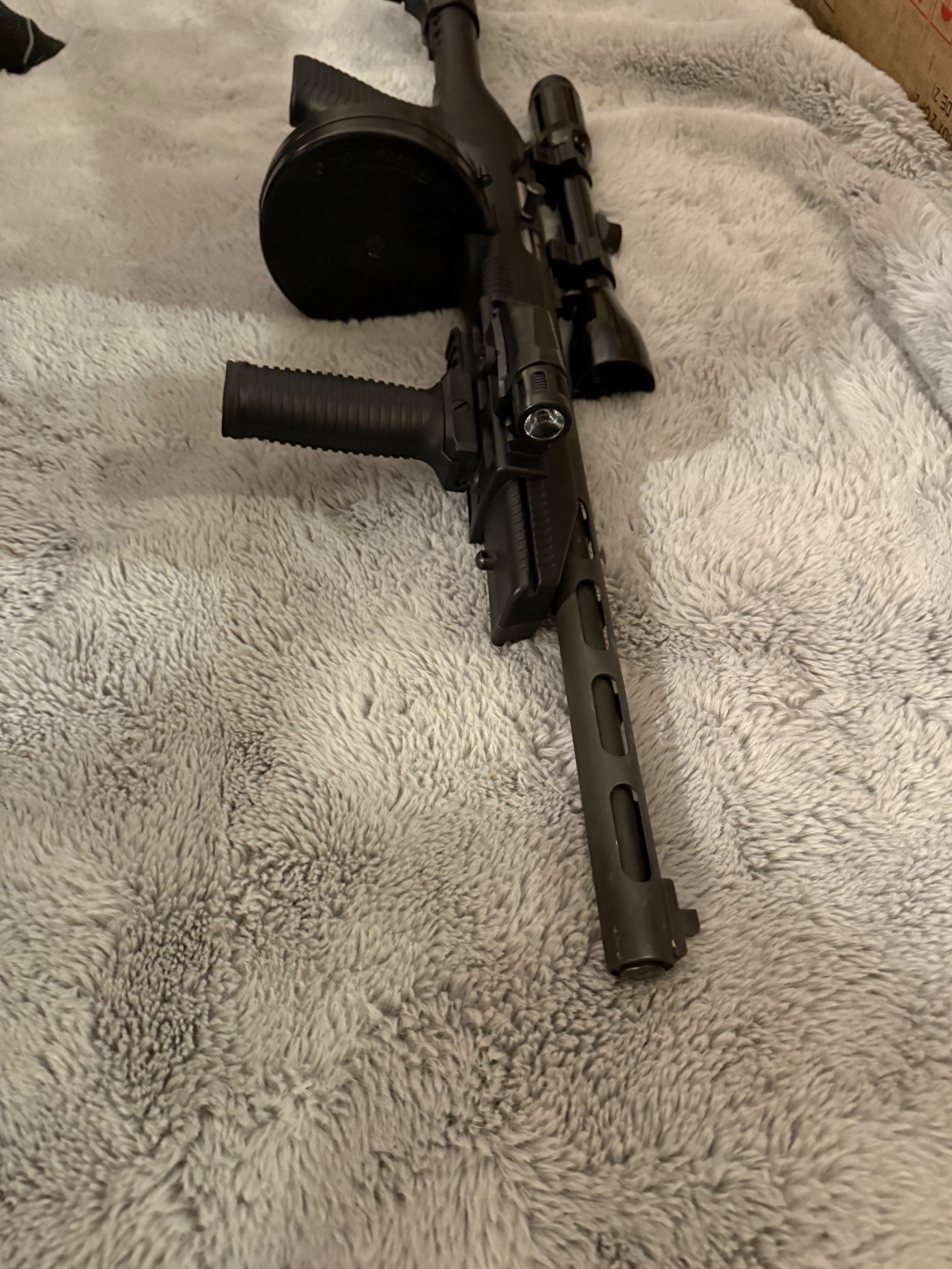 Photo of Pierre’s pps 50 with drum mag and scope