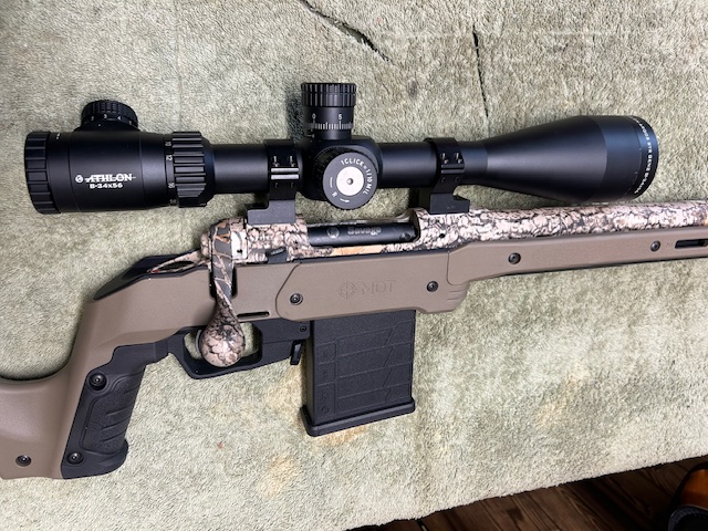 Photo of Savage Model 10, tactical, "with scope and MDT", 243 win, as new, I will ship 