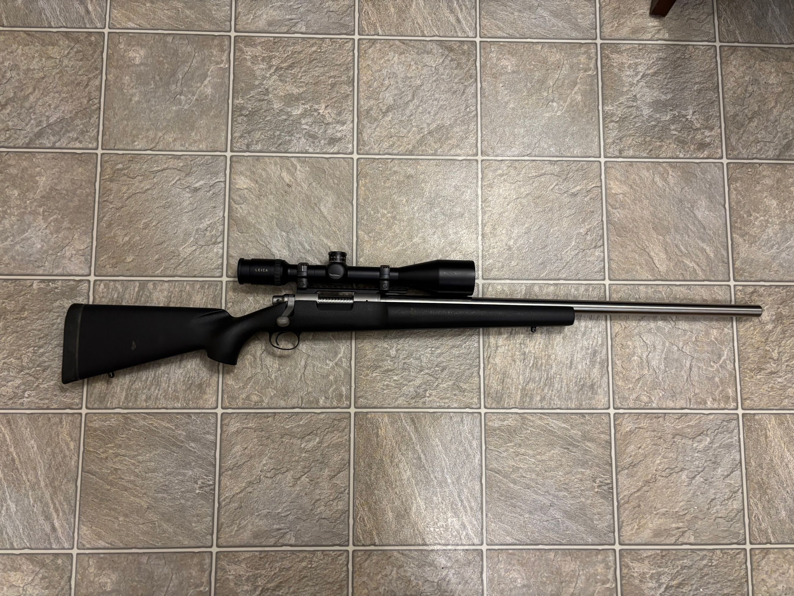 Photo of Remington 700 (Custom Shop) in 7mm RM. with Leica ER-LRS 6.5-26X56 Optics