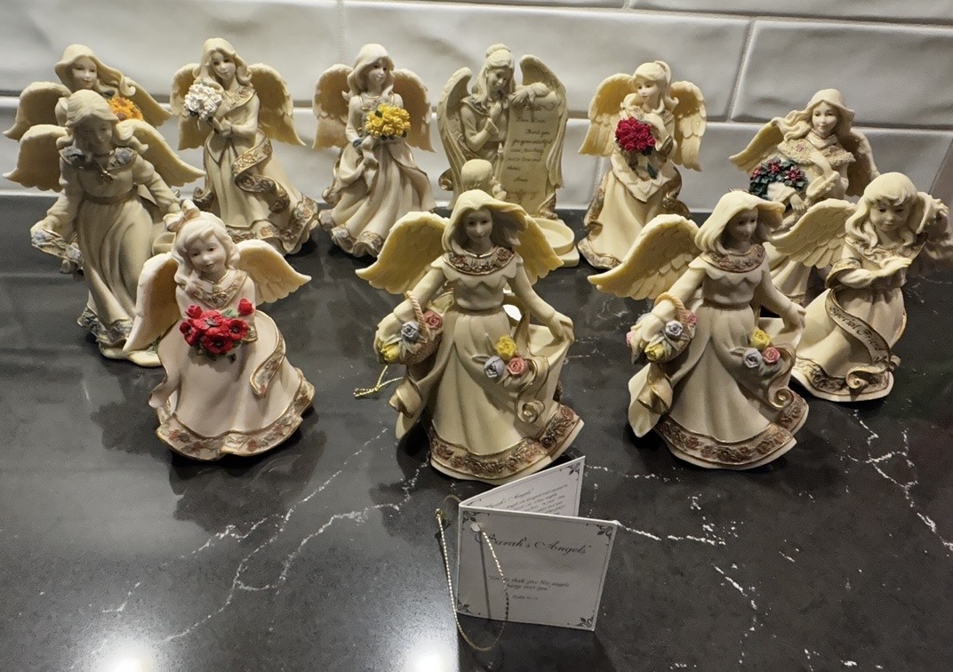 Photo of 11 Sarah's Angels figurines 