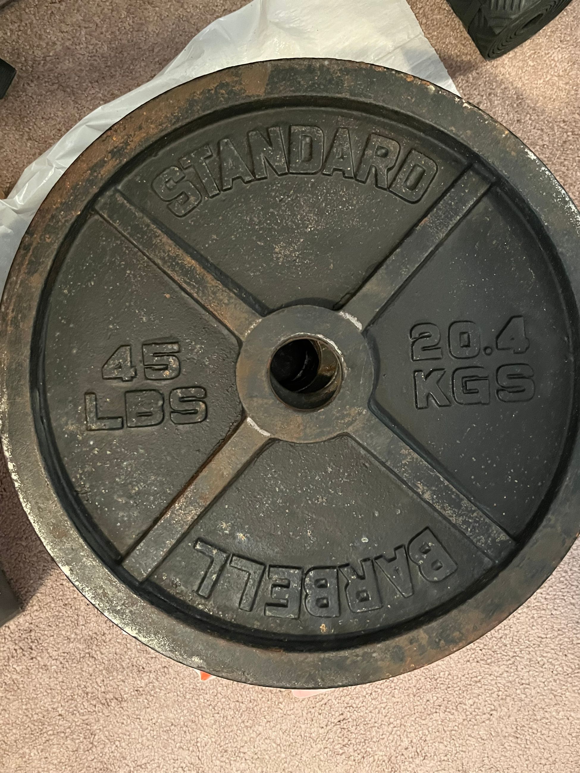 Photo of 6 Standard Barbell 45 lb Plates 