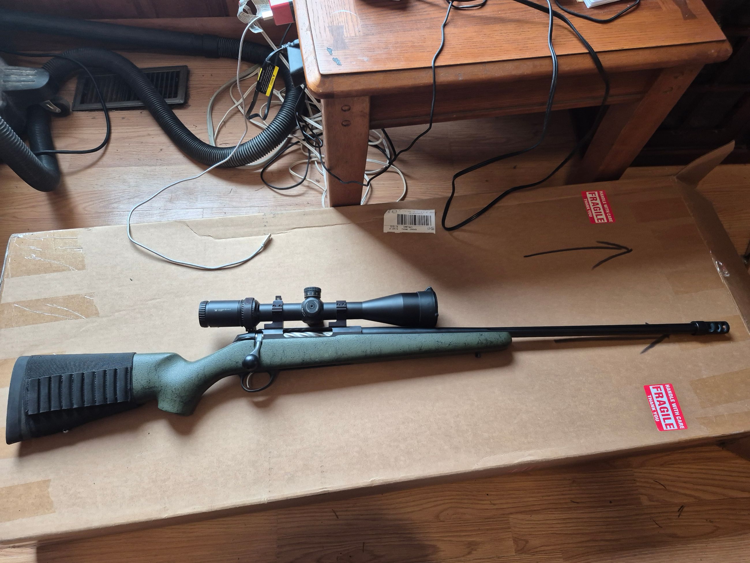 Photo of Tikka T3X Roughtech 6.5 w' Vortex Strike Eagle 4-24×50