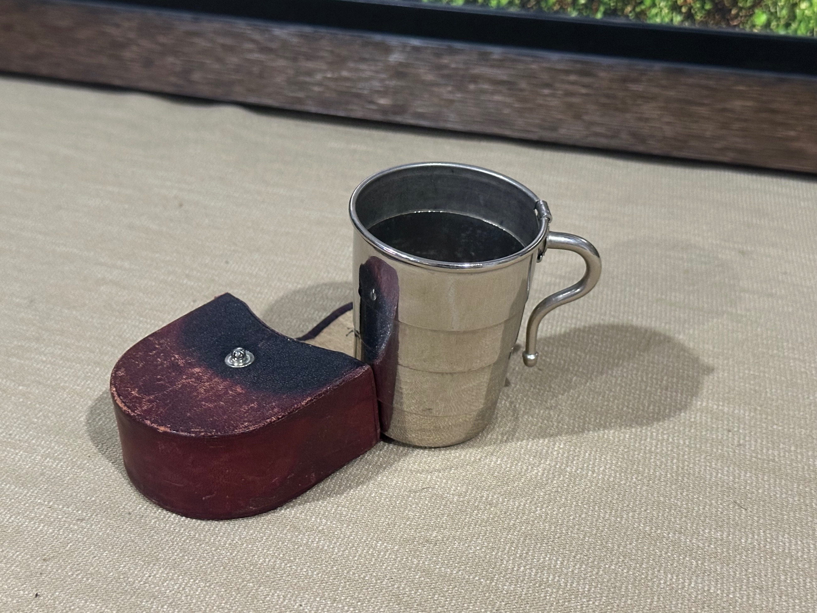 Photo of Silver collapsible drinking cup