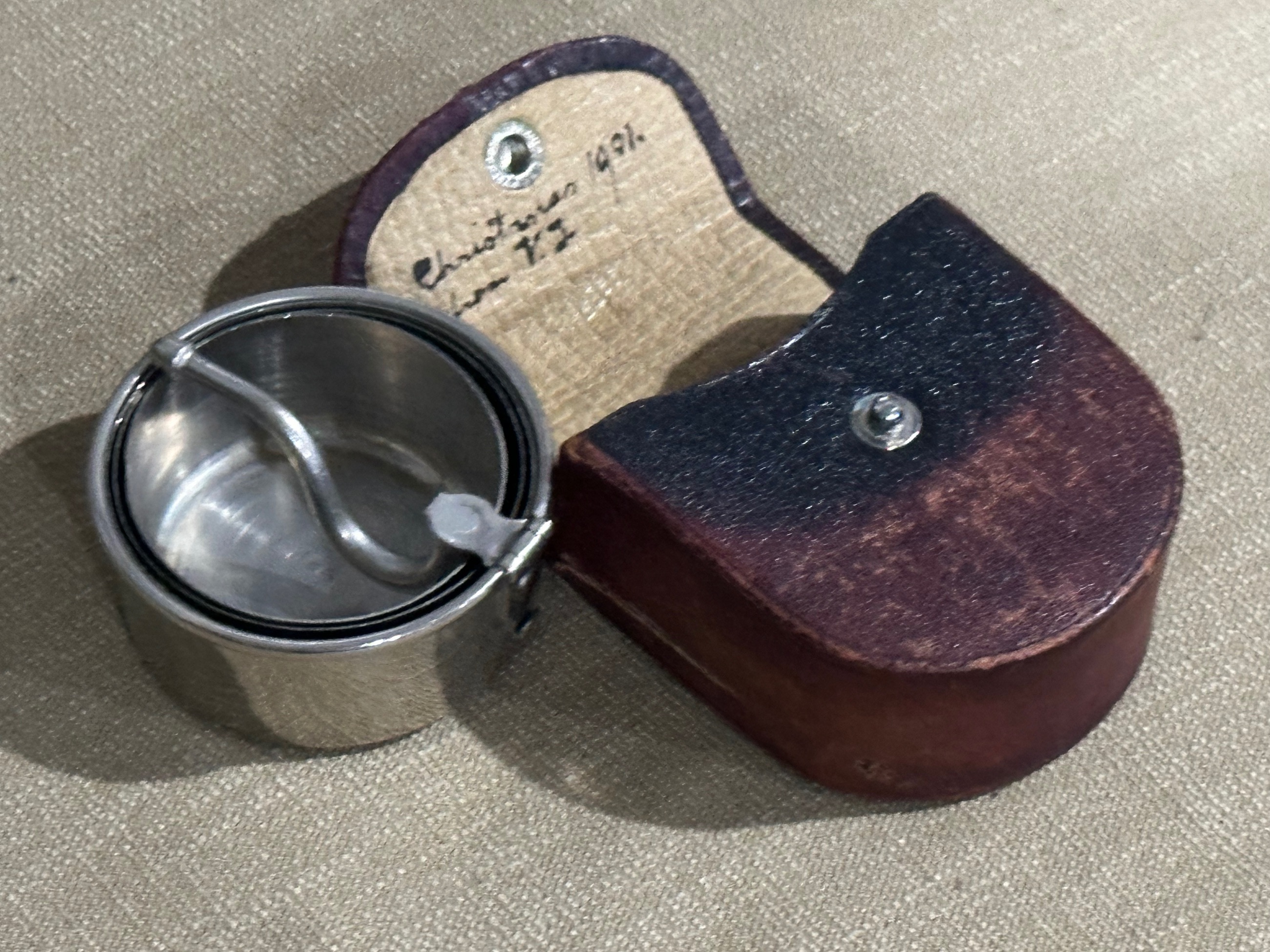 Photo of Silver collapsible drinking cup