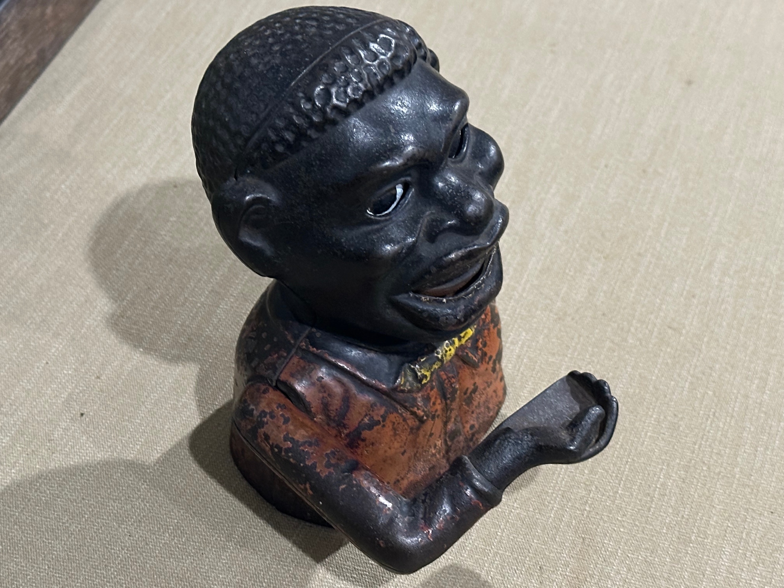 Photo of Cast iron coin mechanical Bank