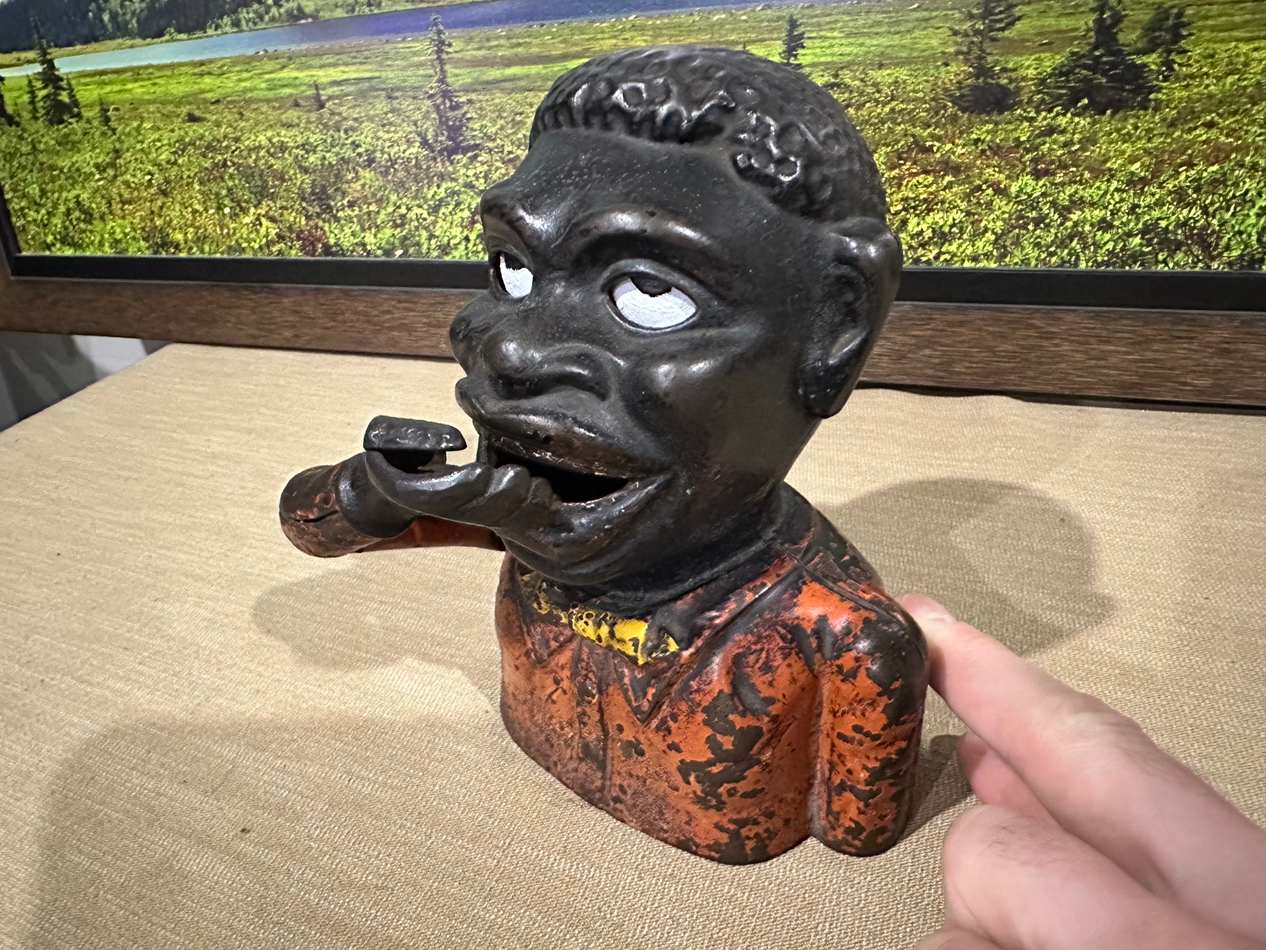 Photo of Cast iron coin mechanical Bank