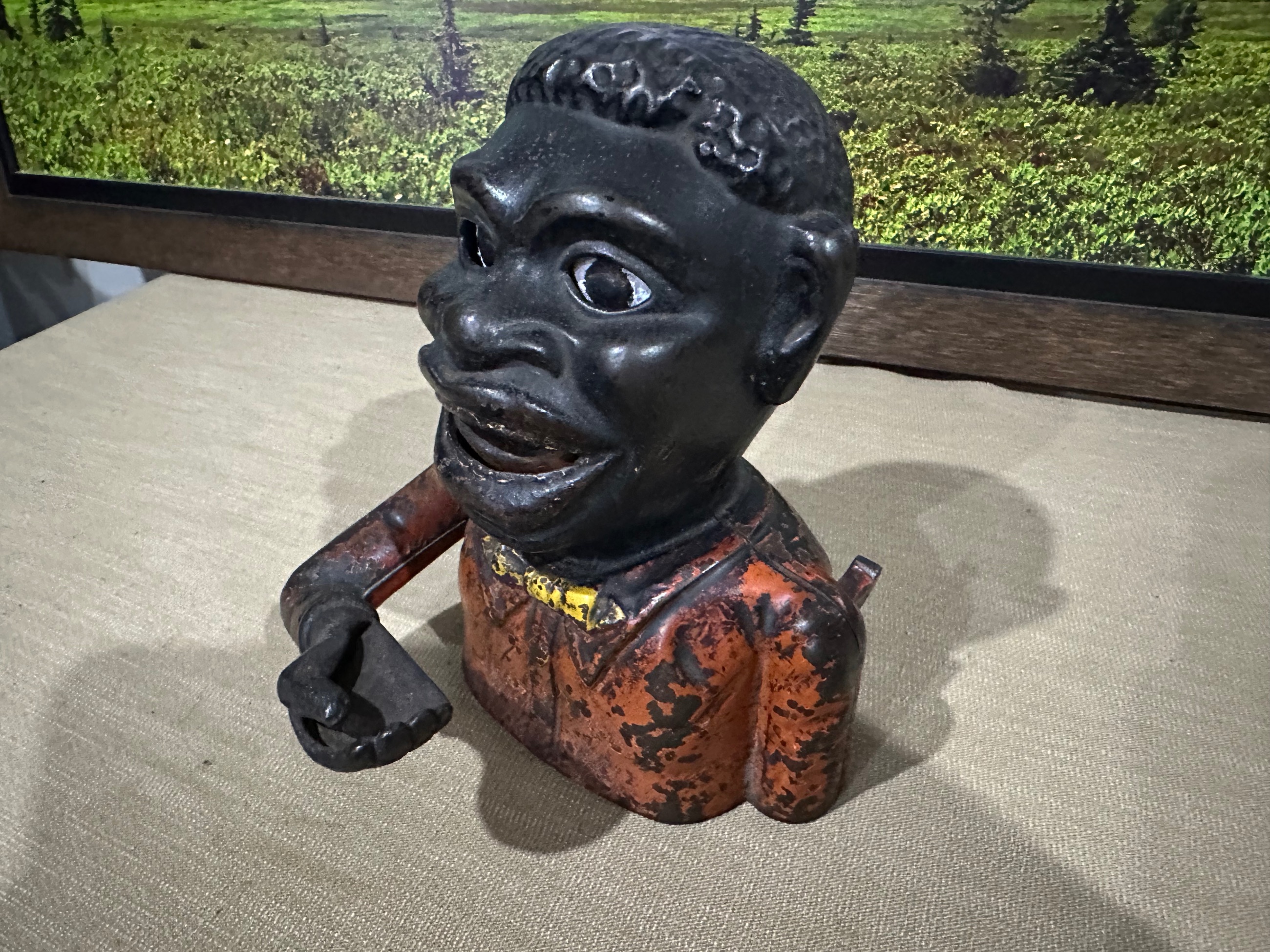 Photo of Cast iron coin mechanical Bank