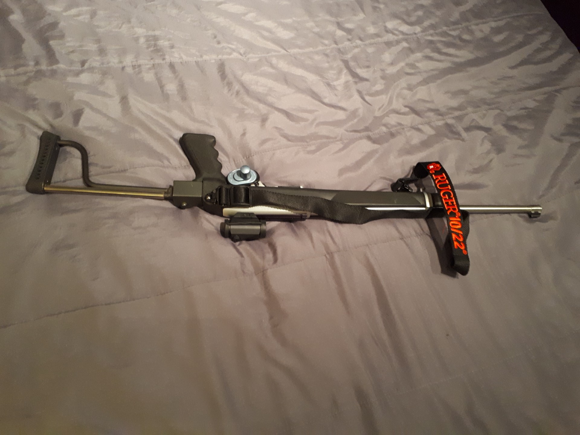 Photo of Like new ruger 10/22 folder with red dot