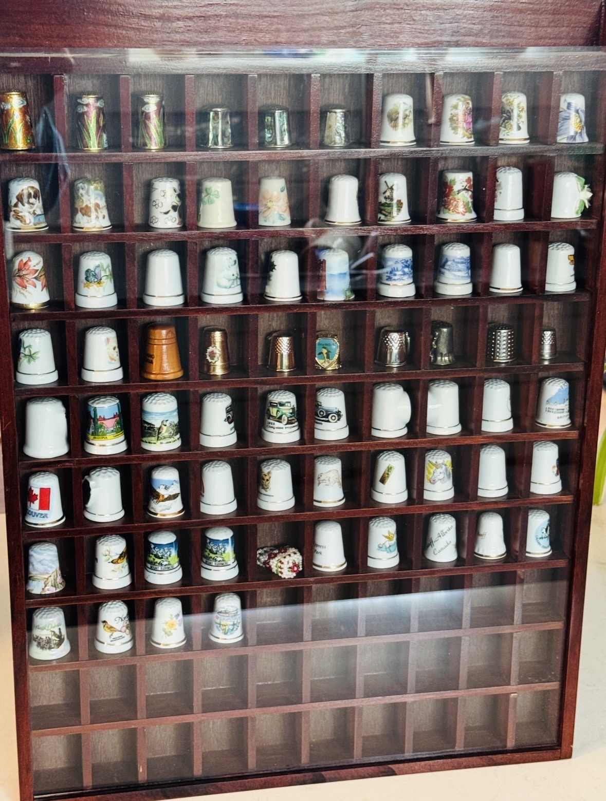 Photo of 74 vintage thimbles/ 100 spaces display case