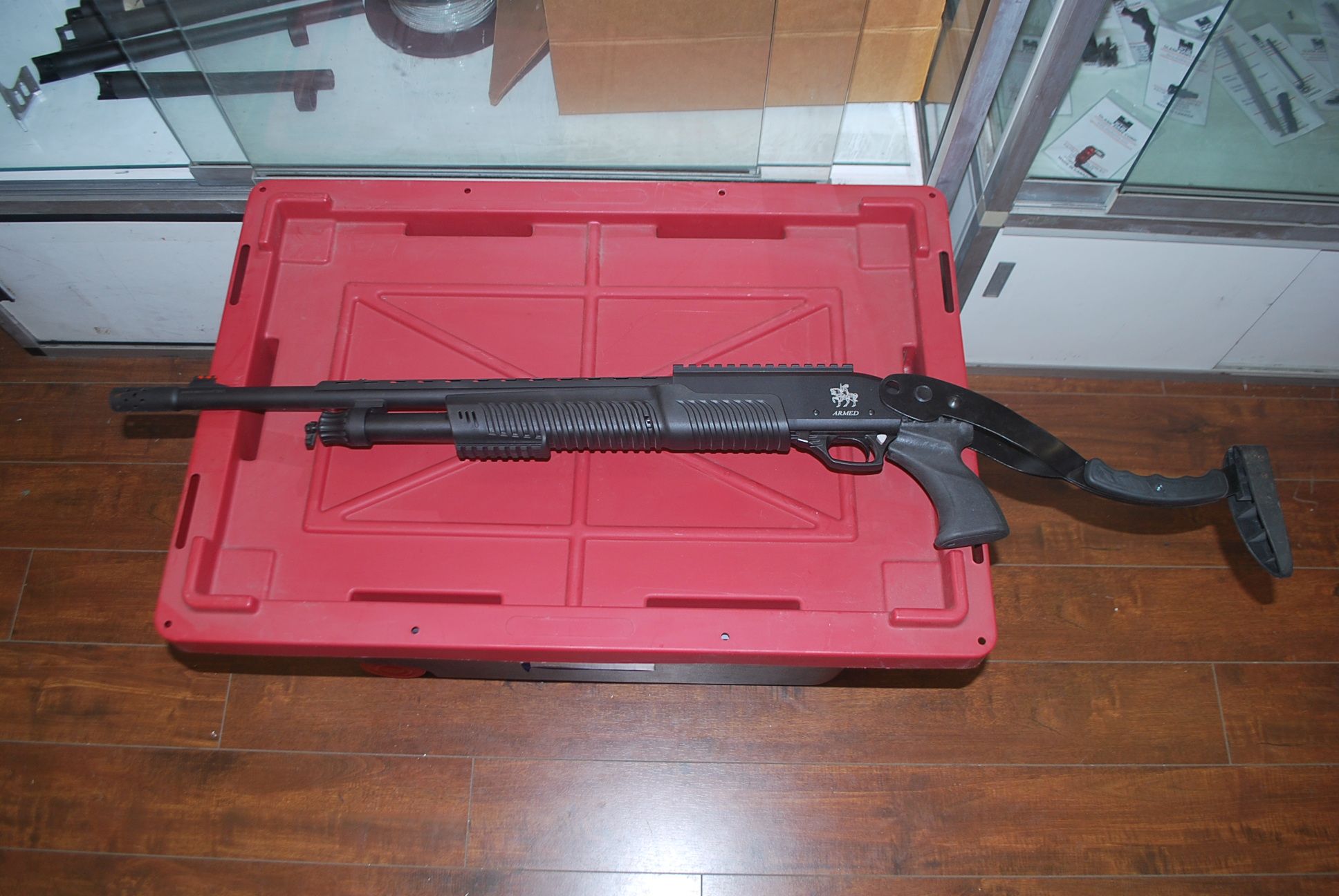 Photo of Armed 12 gauge pump shotgun