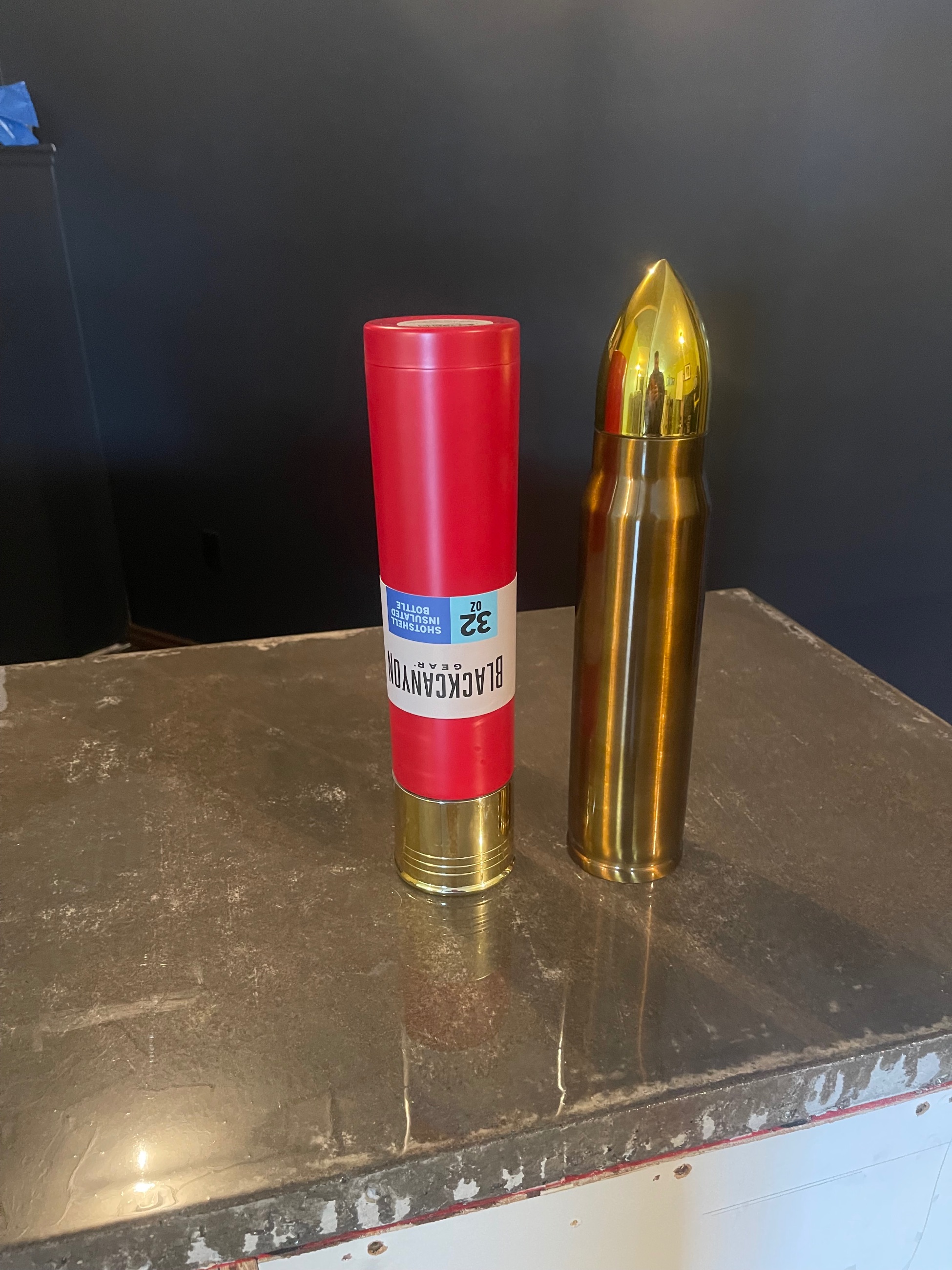 Photo of Shotgun shell rifle, shell, thermoses, or water bottles