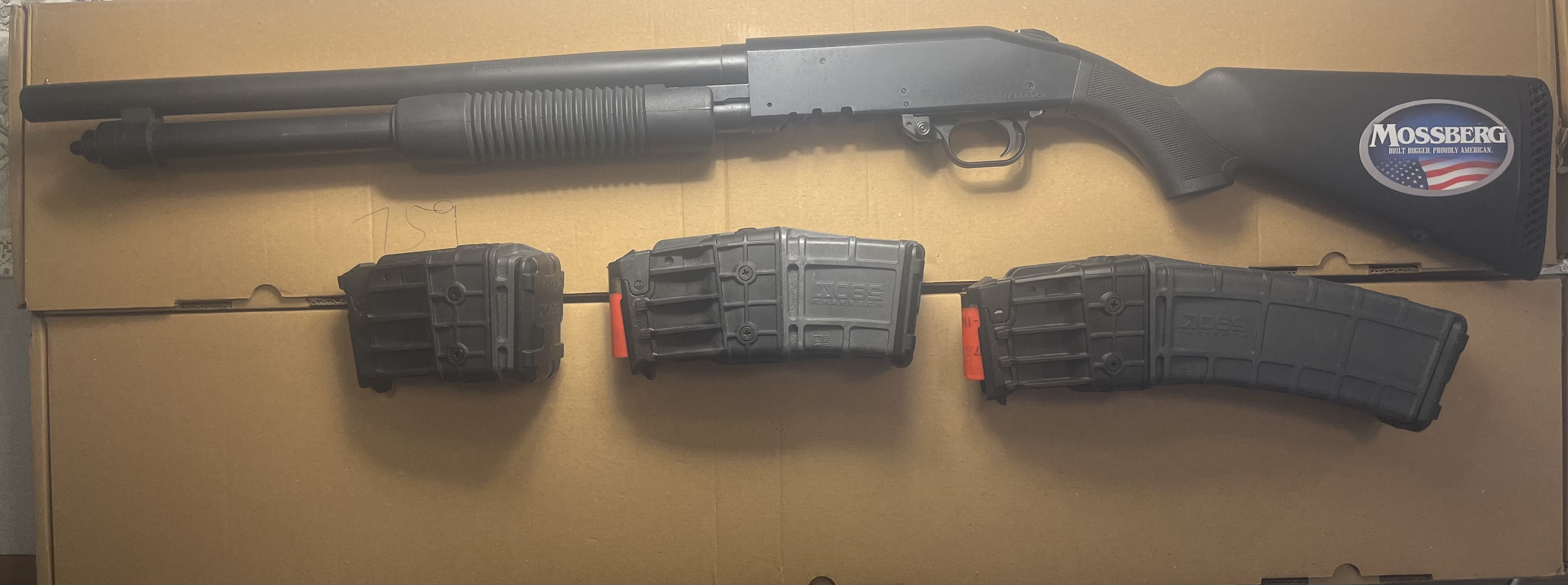 Photo of Mossberg 590M Pump Action Shot Gun 3 Mags