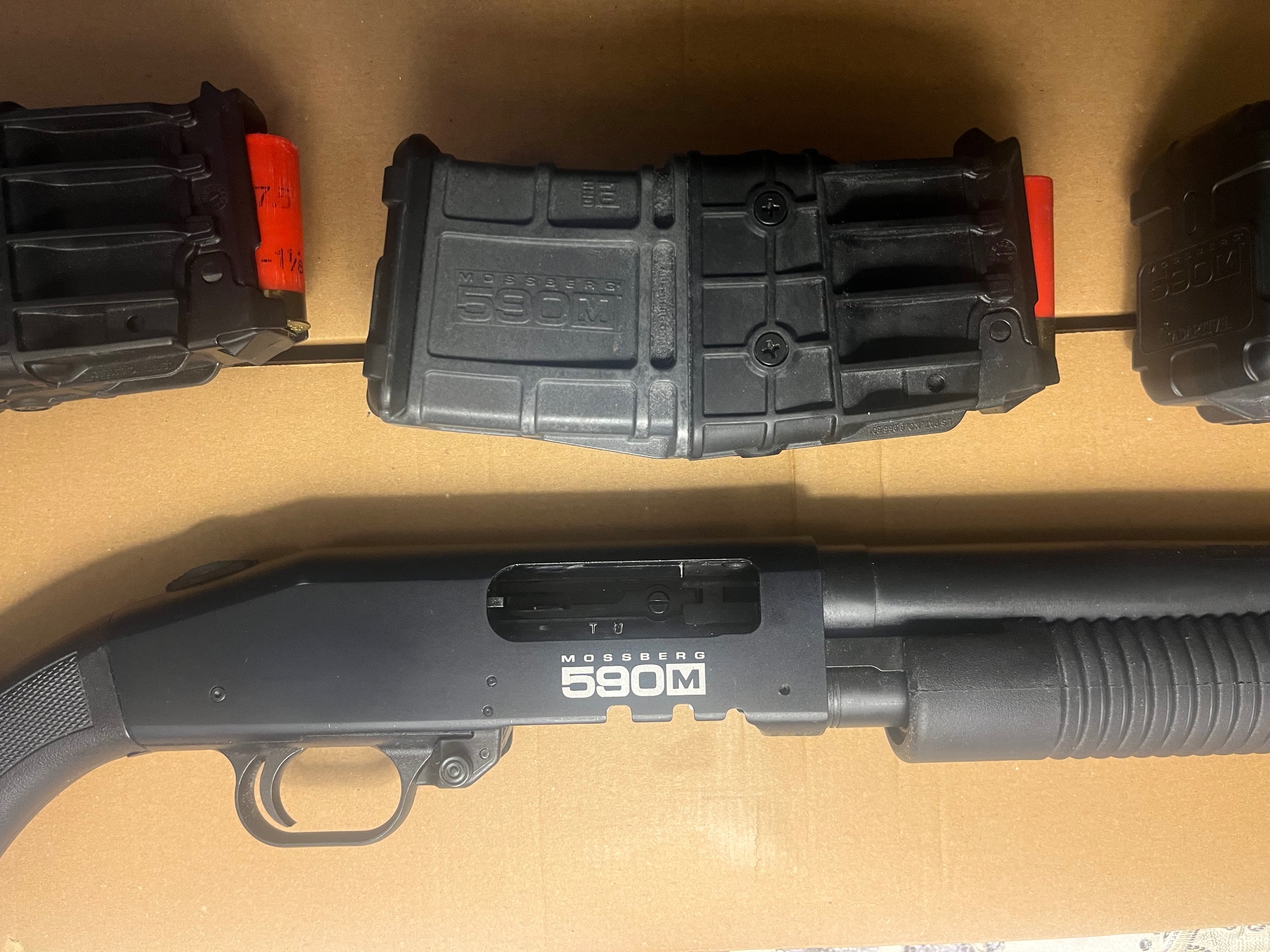 Photo of Mossberg 590M Pump Action Shot Gun 3 Mags