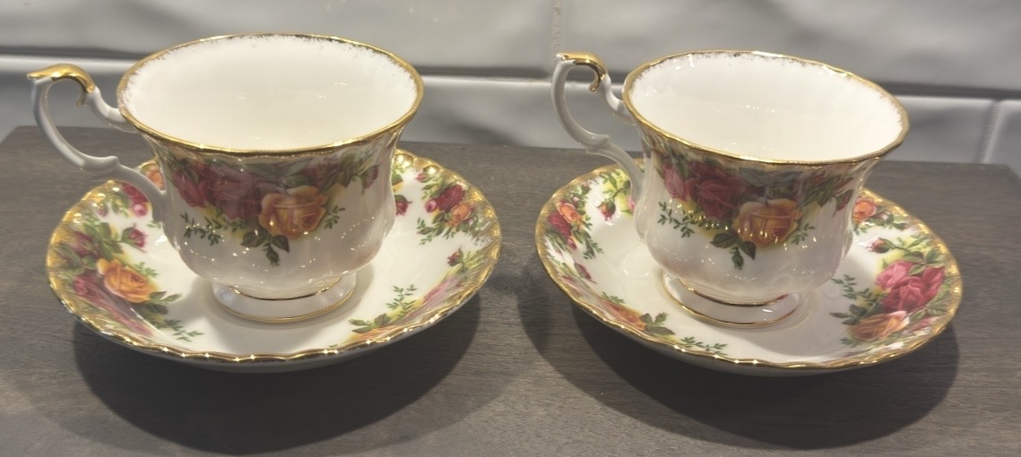 Photo of Two Royal Albert Old Country Roses bone china teacups and saucers.