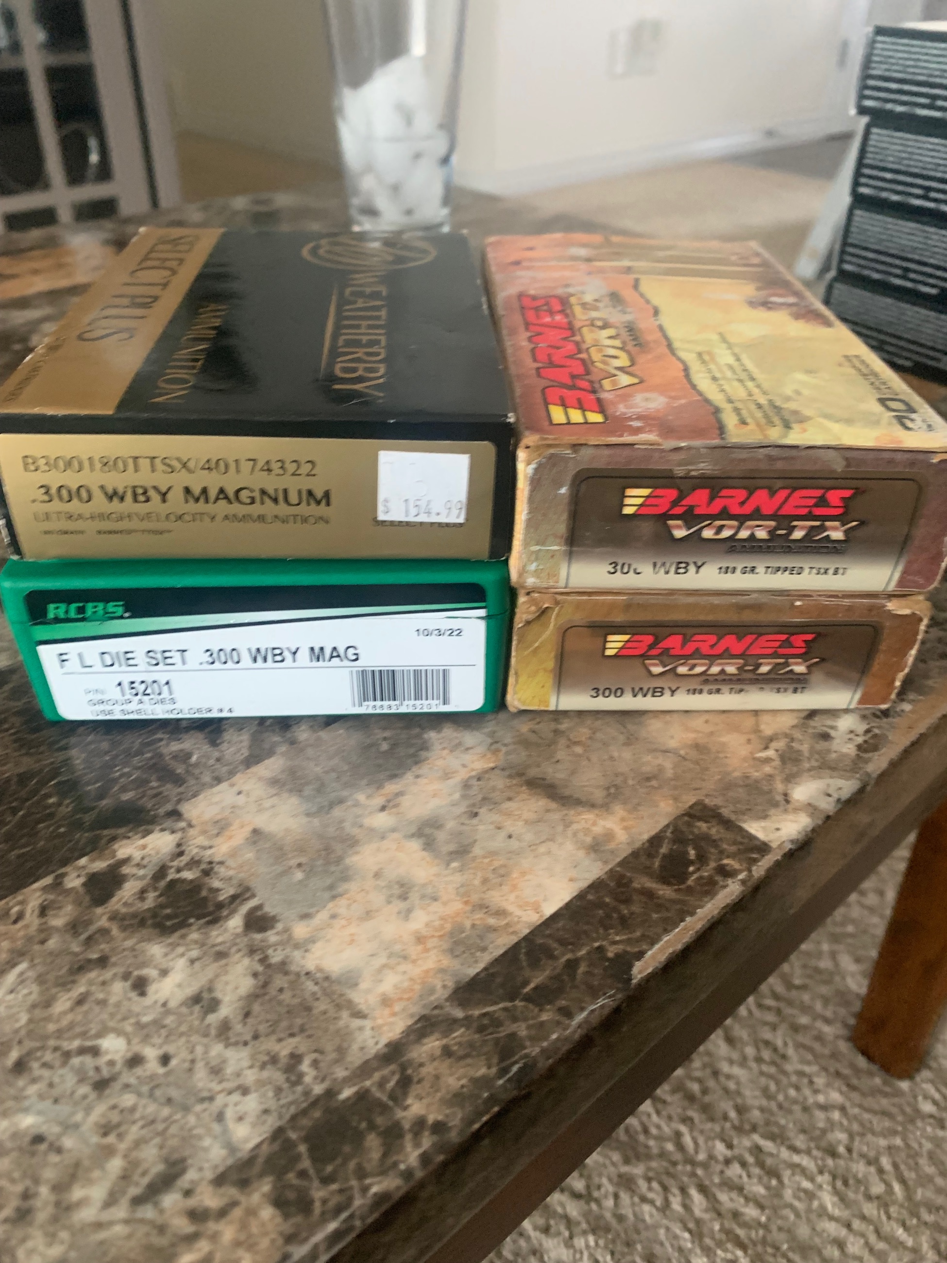 Photo of 300 Wby ammo and dies. 