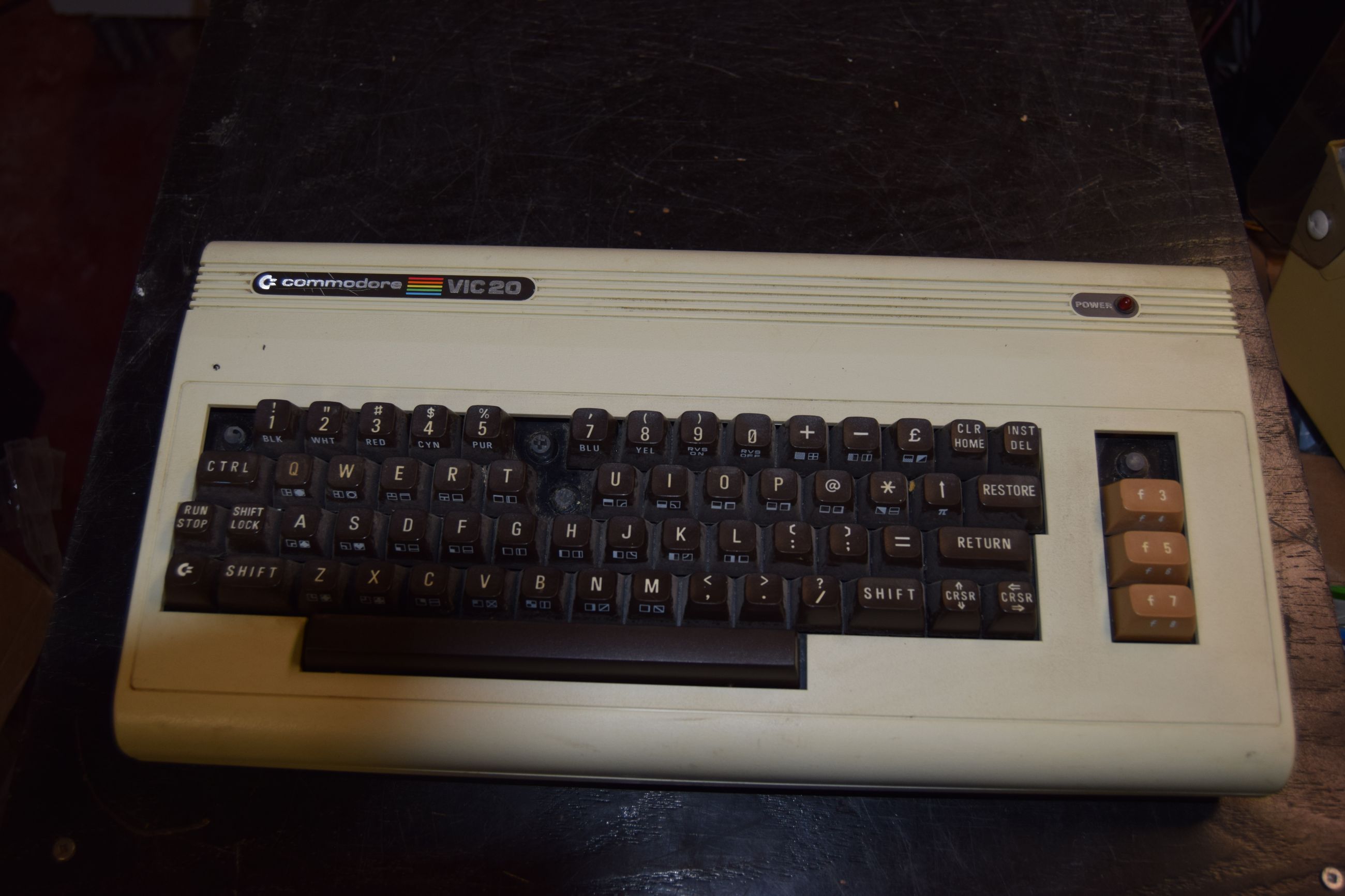 Photo of Commodore Vic 20 with dataset and programming manual