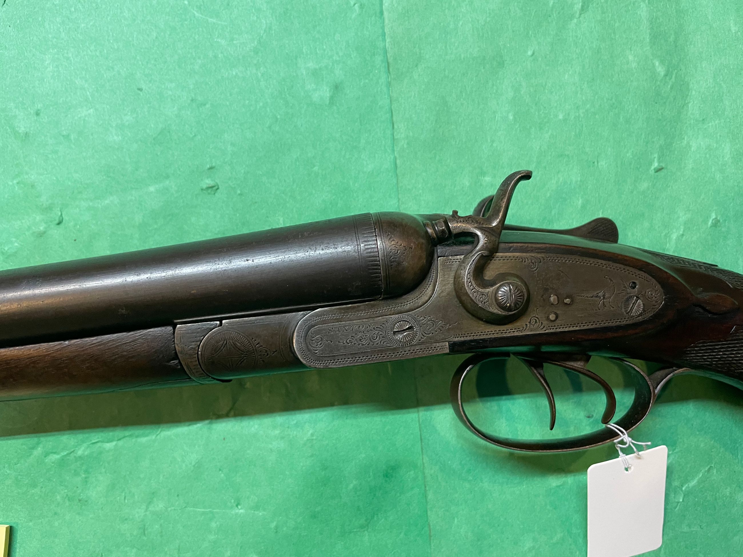 Photo of WALL HANGER 12 GA SXS