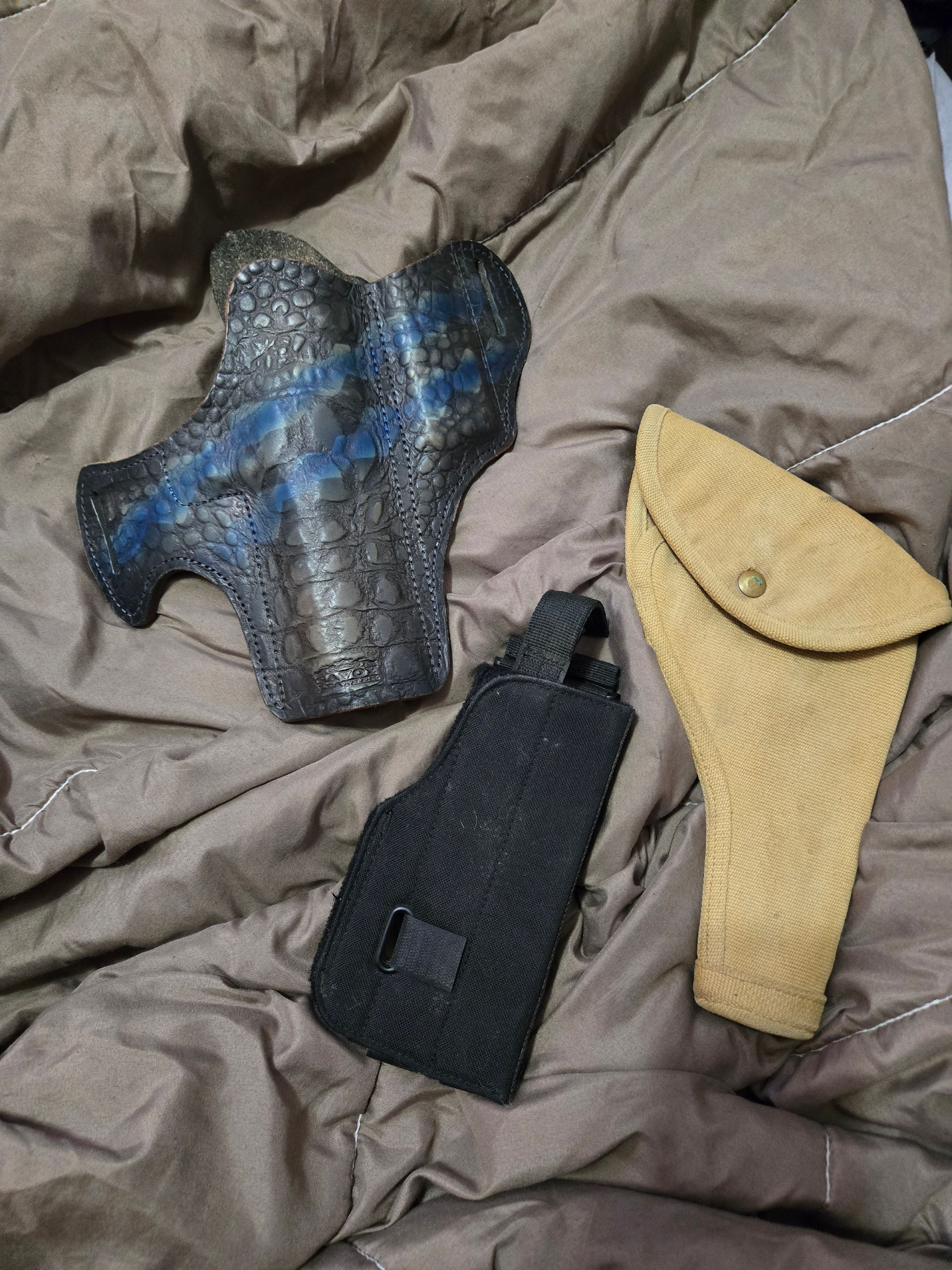 Photo of 3 holsters for sale