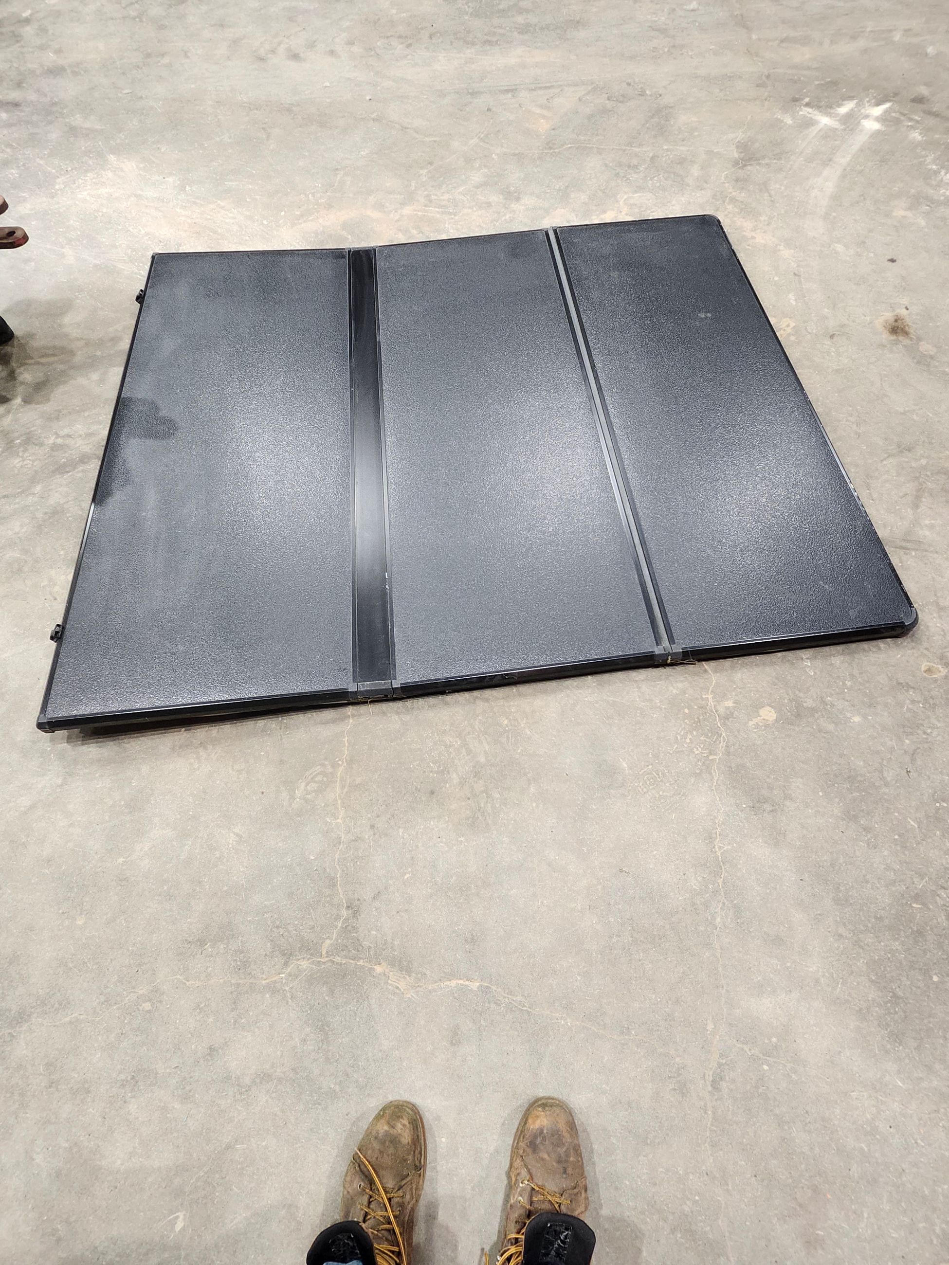 Photo of Extang solid tri-fold tonneau cover