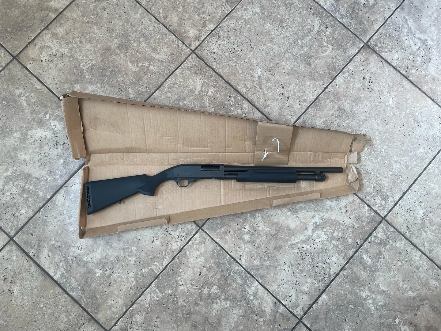 Photo of Blue Line Hawk 12 gauge shotgun. New