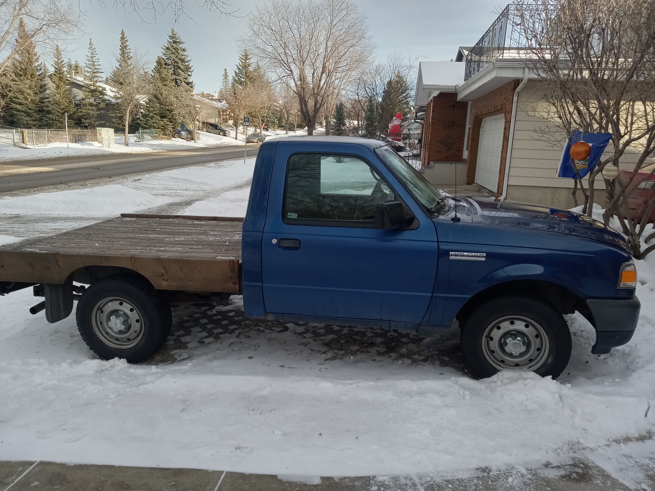 Photo of Ford Ranger 2009 2.3 5-speed with flatbed 170k