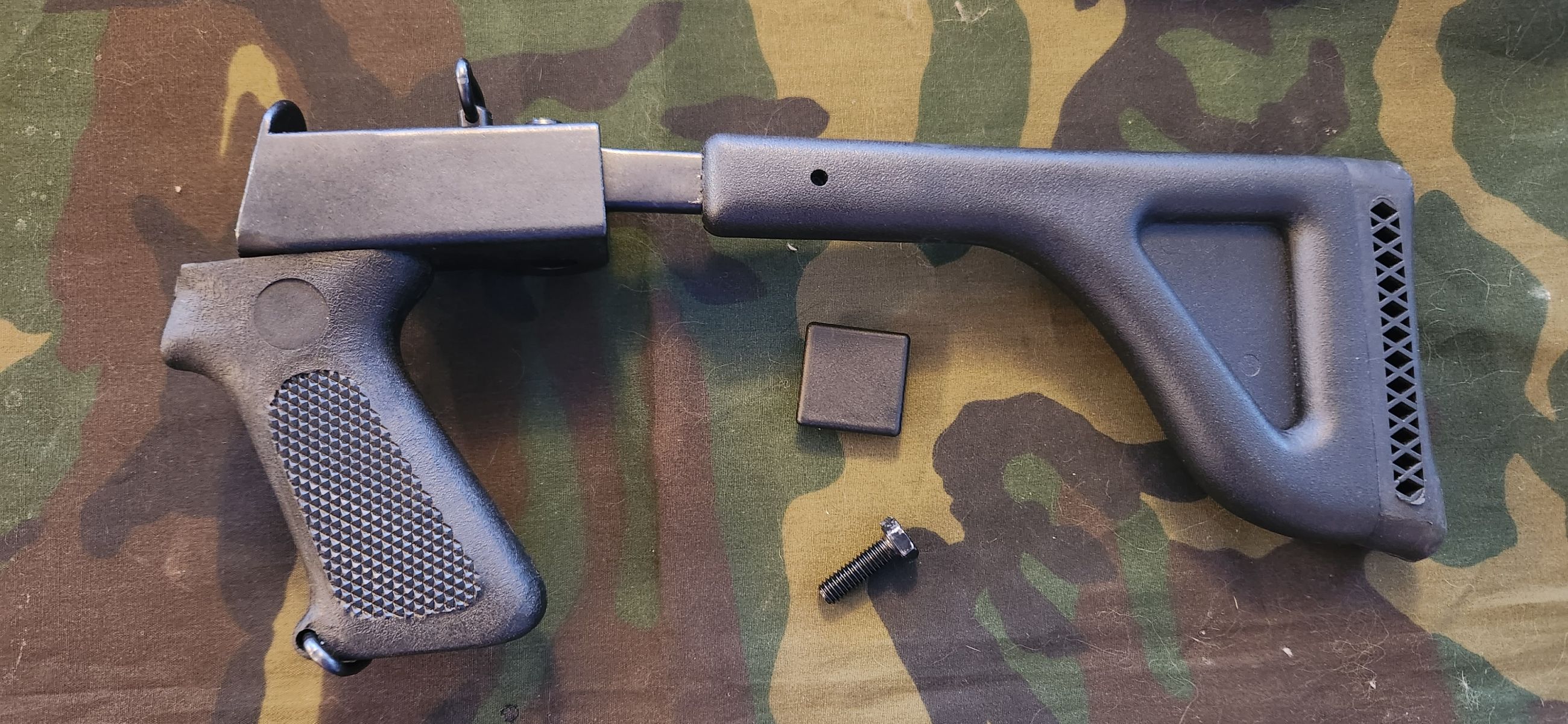 Photo of Butler Creek side fold Mossberg 88, 500, 590 shotgun stock