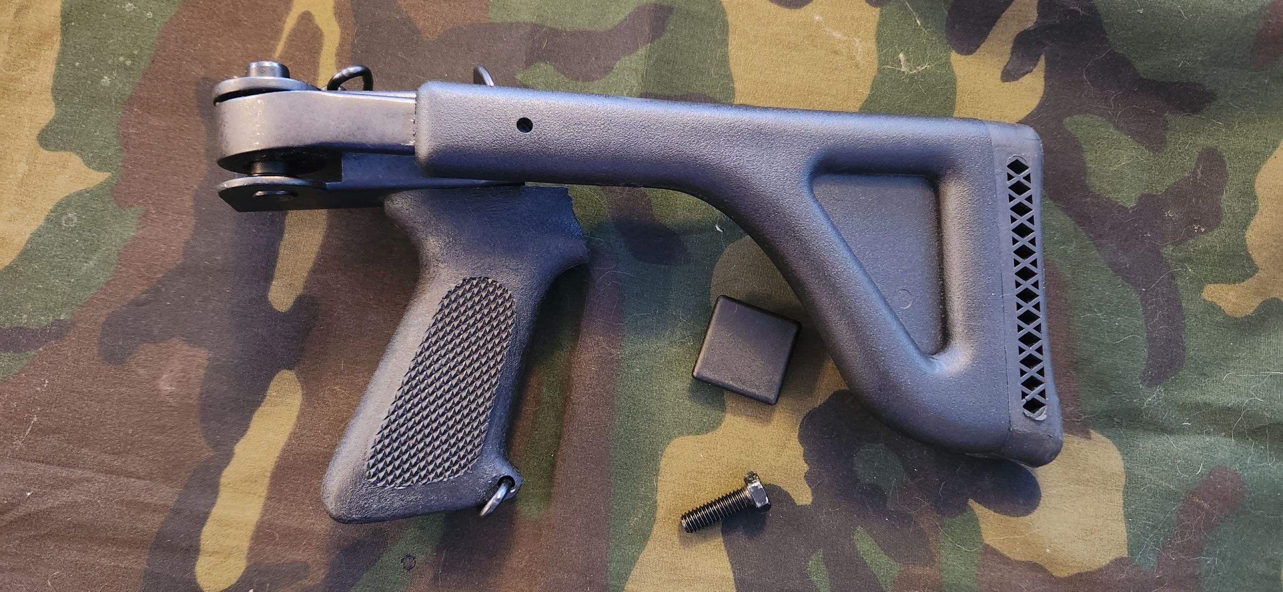 Photo of Butler Creek side fold Mossberg 88, 500, 590 shotgun stock