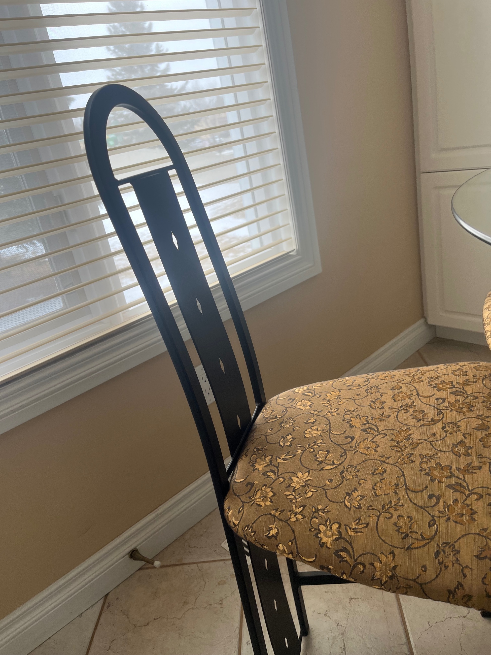 Photo of Stylish glass table and four chairs